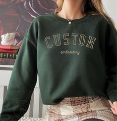 * Your custom text embroidered on super soft and comfortable 50/50 cotton/poly sweatshirt. * Sizes are in Unisex/Men's sizing and runs normal. * Size charts shows the sweatshirt measurement when it is laid flat. * We DO NOT send mockups for this item.  If you have to have a mockup, please Zelle or Venmo $15 to info@camelsota.com with your order number and message to let me know.  Your order processing time will increase by 3-5 business days. Winter Crew Sweatshirt With Letter Embroidery, Winter Fleece Sweatshirt With Embroidered Logo, Crew Hoodie With Letter Embroidery For Winter, Winter Crew Hoodie With Letter Embroidery, Embroidered Crew Sweatshirt For Winter, Crew Sweatshirt With Embroidered Logo For Winter, Winter Crew Sweatshirt With Custom Embroidery, Winter Crew Sweatshirt With Embroidered Logo, Winter Crew Neck Sweatshirt With Custom Embroidery