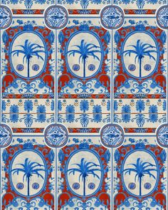 a blue and red tile with palm trees