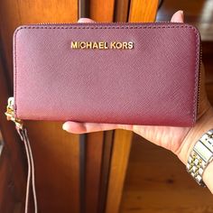 Michael Kors Multi Function Wallet & Wristlet. Brand New With Tags. Maroon Color With Gold Zipper. Place For Card Holders. Coin Section As Well. W: 7” L: 4” Classic Burgundy Clutch, Bags Michael Kors, Wallet Wristlet, Maroon Color, Gold Zipper, Card Holders, Michael Kors Bag, Card Holder, Coin