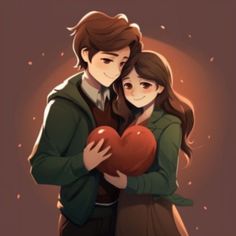 two people hugging each other while holding a heart