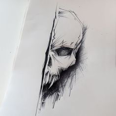 a drawing of a skull on paper with pen and ink in the shape of a human head