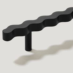 a long black object on a white background