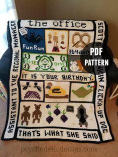 a blanket that has been made to look like it is on the floor with pictures and words