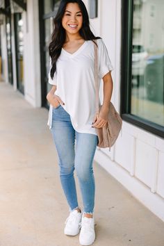 This versatile v-neck tee is here to make your life easy! It's honestly the perfect top for year round styling and layering. You can knot the hem or half tuck into your favorite jeans or shorts. You can layer it with all sorts of jackets, shackets, or kimonos. And don't even get us started on accessories! The options are absolutely endless! This top is truly a staple piece! This top features a v neckline, short cuffed sleeves, and a generous fit. Material has generous amount of stretch. Cindy is Spring V-neck T-shirt For Casual Gatherings, White V-neck Top For Casual Gatherings, White V-neck Top For Everyday Spring Wear, White V-neck T-shirt For Day Out, Casual V-neck Top For Spring Layering, Mint Julep Boutique, Mint Julep, Ivory White, Staple Pieces