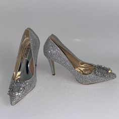 Add A Touch Of Elegance To Your Wardrobe With These Badgley Mischka Cher Ii Pointed Toe Pump Heels. These Ivory Colored Pumps Are Adorned With Rhinestones, Giving Them A Glamorous Look. The Textile Upper, Synthetic And Textile Lining, And Leather Sole Make Them Comfortable To Wear For Any Occasion. These Size 5.5 & 6 Women's Shoes Have A Standard Shoe Width And Are Perfect For Any Formal Event. The Brand, Badgley Mischka, Is Well-Known For Their Luxurious Designs. These Pumps Are Perfect For Completing Any Outfit With A Touch Of Class And Sparkle. New Without Box Retail Price : $265 Guaranteed 100% Authentic Heels Rhinestone, Pump Heels, Badgley Mischka Shoes, Badgley Mischka, Ivory Color, Pumps Heels, Formal Event, Women's Shoes Sandals, Women's Shoes