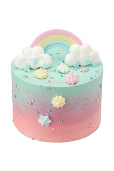 a colorful cake with clouds and stars on it