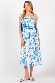 Get ready for the ultimate summer romance with our True Love Maxi Dress! This midi-length beauty features a stunning floral print, playful ruffle details, and adjustable straps for the perfect fit. Complete with a convenient back zipper and smocking detail, this flowy dress will have you twirling all day. Don't miss the adjustable tie side ribbons for an extra flirty touch. Lover Dress, Yellow Gifts, Maxi Romper, Beauty Features, Summer Romance, Free Dresses, Pink Midi Dress, Leather Dresses, Maxi Dress Party