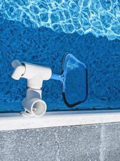 an object is placed on the edge of a swimming pool