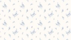 a white and blue floral wallpaper with small flowers on the bottom half of it