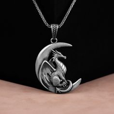 Cute Dragon Pendant, Dragon in Crescent Moon Necklace, Silver Mythology Men Jewelry, Best Friend Necklace, Remembrance Gift, Birthday Gift Made of 925 silver and handcrafted by hand, this ring is not only an accessory piece that complements your daily elegance, but also has details that will reflect your character and style. It is also a great gift to give to your loved ones on their special days. At SavisSilver, we always give importance to the satisfaction of our customers, we recommend you to Antique Moon-shaped Jewelry Gift, Antique Moon Shaped Jewelry For Gift, Antique Moon Shaped Jewelry Gift, Antique Moon Charm Necklace As Gift, Antique Moon Charm Necklace Gift, Antique Moon Charm Necklace For Gift, Vintage Moon-shaped Necklace For Gift, Vintage Moon Shaped Necklace For Gift, Symbolic Necklace For Father's Day Gift