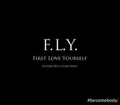 a black background with the words fly first love yourself