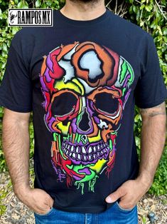 Handmade Serigraphy Print, Mexican Mens T-Shirts Graphic Tees that are super stylish , bright and glow in Blacklight , Neon Lights, Mexican Art Skull shirts , made by Artisans in Mexico in several designs . Mexican men Shirts. Short sleeve Men's apparel made of ultrasoft 100% cotton, this comfortable style is designed with a classic crew neckline, short sleeves and relaxed Fit, Our t-shirt is a perfect gift for that special person near you.  Please check the Product images for Size measurements guide Follow us in Instagram and Facebook: @RamposMX Multicolor Graffiti Print Cotton T-shirt, Halloween Graffiti Print Crew Neck T-shirt, Cotton T-shirt With Multicolor Graffiti Print, Neon Graphic Print T-shirt With Crew Neck, Black Rave T-shirt With Screen Print, Casual Neon T-shirt With Screen Print, Neon Cotton Crew Neck T-shirt, Black Cotton Rave T-shirt, Black Crew Neck T-shirt For Rave