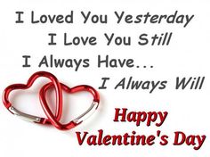 two red heart - shaped handles are on top of a white card that says, i love you still i always have i always will