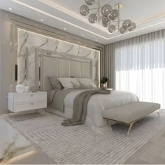 a large white bed sitting in the middle of a bedroom next to a tall window