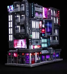 a model of a building with neon lights on it's windows and balconies