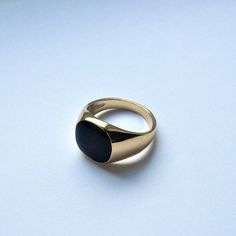 The Ring for Daily wear. Made from stainless steel & Black Enamel, this ring will continue to last. Combine with our Black & Gold Onyx necklace for the Set! DETAILS  Hypoallergenic | No Tarnishing | No Fading | No Irritation Materials: Made from Recycled Stainless Steel / 18K Gold PVD Plating Included in our Lifetime Warranty Packed in a Twistedpendant Jewellery Pouch SIZE DETAILS This ring is available in US sizes 6-12. All the measurements are detailed in our size chart. Sizes 6-7 = XS / S | S Black Onyx Ring Gold, Mens Ring Gold, Pinky Ring Gold, Mens Pinky Ring, Mens Gold Rings, Gothic Rings, Ringe Gold, Black Ring, Onyx Necklace