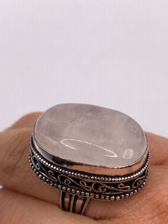 Vintage rose quartz Ring  Silver white bronze  NOT 925  Very detailed  Size 7 My jeweler can re size it for a $20 fee.  Ships free in the US in a nice gift box  Please check out our THOUSANDS of great feedback reviews Silver Rose Quartz Crystal Ring Gift, Spiritual Nickel-free Moonstone Ring As A Gift, Rose Quartz Crystal Ring Gift, Vintage Moonstone Ring With Large Stone As Gift, Vintage Moonstone Ring With Large Stone For Gift, Oval Rose Quartz Rings As Gift, Oval Rose Quartz Rings For Gifts, Oval Rose Quartz Rings For Gifting, Silver Rectangular Moonstone Ring Gift