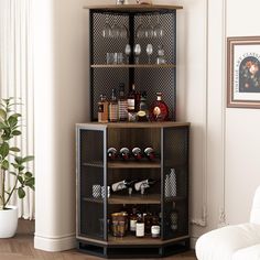 a corner cabinet with bottles and glasses on it