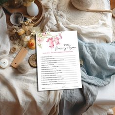 a table with flowers and other items on it, including a paper that says outlining