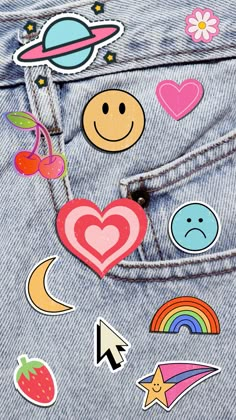 the back pocket of a pair of jeans with stickers on it and an assortment of smiley faces