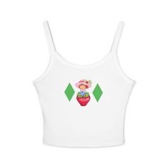 A strawberry shortcake tank top perfect for costumes or as a cute addition to your wardrobe. I have different variations on my store of this design, this one is a twist to one of strawberry shortcake shirts, and it is the tank top version. It gives off a playful and fun vibe, suitable for casual wear or themed events. This tank top is relevant for those looking for a unique and quirky piece to add to their collection, suitable for summer gatherings, picnics, and themed parties.   Product features - Soft and luxurious fabric blend of 52% Airlume combed ringspun cotton and 48% polyester - Thick spaghetti straps for comfort and support - Mid-length cut for the perfect balance between coverage and mobility - Socially conscious manufacturing standards with FLA and WRAP certification - Printed u Sweet Fitted Sleeveless Top, Sweet Sleeveless Fitted Top, Fitted Sleeveless Sweet Top, Cute Fitted Tank Top, Kawaii Fitted Sleeveless Top, Fitted Sleeveless Kawaii Top, Cute Graphic Print Tank Top, Sleeveless Cotton Kawaii Top, Cute White Crop Top Tank Top