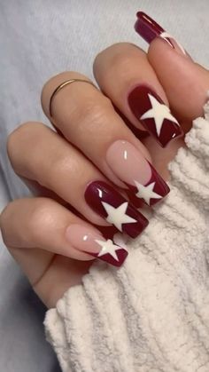 Short Red Hoco Nails, Almond Nails With Star Design, Dark Red Gel X Nails, Easy Nail Art Coffin Shape, Cute Burgundy Nails Acrylic, Star Nails Square Long, Maroon Nail Design Ideas, Ziggy Stardust Nails, Nails With Different Colors On Each Nail