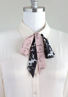 "Black, white, and pink neck scarf in a shadow bouquet/face print mix. Ready to ship, special edition midi-length skinny scarf designed by Cinne. Full of character with endless styling possibilities. Wear around your neck, in your hair, tied on your favorite bag, or around your wrist. Find more styling examples in second to last photo. Constructed entirely by hand with love and attention to every detail. . . . . . . . . . . . . . . . . . . . . . . . . . . . . . . . . . . . . . . . . . . . . . . Trendy Scarves With Ties For Spring, Adjustable Scarf Neckwear For Spring, Trendy Spring Scarves With Ties, Trendy Scarf Neckwear As Gift, Trendy Black Scarf As Gift, Chic Black Scarf For Gift, Chic Scarves With Ties, Chic Adjustable Scarves With Ties, Casual Adjustable Scarf Neckwear