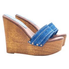 Clogs with Wedge brown wood effect base with double band in blue denim Comfortable padded insole Wedge height 13 cm and plateau 4 cm Stable and comfortable made entirely in Italy Craftsmanship. Manufactured by Kiara Shoes BEFORE COMPLETING YOUR PURCHASE DO NOT FORGET TO CHECK THE SIZE! Denim High Heel Platform Sandals, Denim Blue Platform Sandals In Denim Material, Casual Denim Wedge Sandals With Open Toe, Denim Blue Platform Sandals, Blue Denim Wedge Sandals, Casual Denim Open Toe Wedge Sandals, Casual Wooden Sandals For Summer, Casual Denim Platform Wedge Sandals, Denim Platform Wedge Sandals With Open Toe