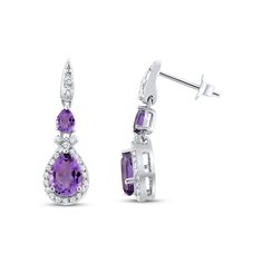 Bring the drama with these regal drop earrings. An eye-catching pear-shaped amethyst suspends beneath sparkling round-cut white lab-created sapphires. Punctuating the style, another sumptuous pear-shaped amethyst dangles from the end, wrapped in a dazzling frame of more round white lab-created sapphires. The earrings are styled in sterling silver with a rhodium finish and secure with friction backs. Purple Drop Chandelier Earrings For Formal Occasions, Purple Teardrop Fine Jewelry Earrings, Classic Teardrop Purple Earrings, Purple Teardrop Drop Earrings For Formal Occasions, Purple Drop Teardrop Earrings For Formal Occasions, Sapphire Drop Earrings, White Lab, The Drama, Accessories Jewelry Earrings