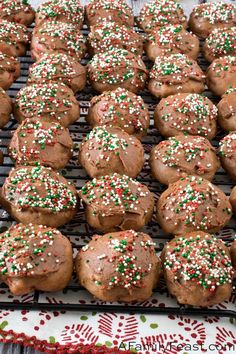 chocolate cookies with sprinkles on a cooling rack