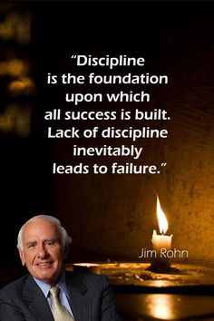 a man sitting in front of a lit candle with a quote from john rohn