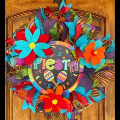 *Sold* Add a pop of color to your front door with this bright colored mesh Fiesta wreath. Every day is a Fiesta! Wreaths make great gifts! If you wish to purchase this wreath as a gift, please let me know what personal message you’d like to include.