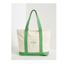 NEW  GUESS  CANVAS TOTE BAG GUESS LOGO PRINT DESIGN CREAM IN COLOR WITH GREEN ACCENTS  MEASURES 19 X 13  INCHES  A NICE SIZE TO CARRY YOUR BOOKS, CLOTHES ETC. ZIPPER TOP CLOSURE TO KEEP YOUR ITEMS SECURE FRONT SLIP POCKET ****CHECK OUT MY OTHER DESIGNER BAGS FOR SALE**** ALL ITEMS COME FROM A SMOKE-FREE ENVIRONMENT AND ARE 100% AUTHENTIC LOCATION: RACKFRD1223 Bag Guess, Beach Book, Beach Books, Bags For Sale, Guess Logo, Green Accents, Zipper Top, Canvas Tote Bag, Designer Bags