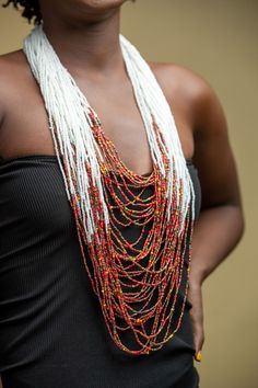 Unique African Maasai Handcrafted Beaded Necklace with an Elegant Look and Brilliant Finish. **GET FREE SHIPPING FOR ADDITIONAL ITEMS PURCHASED. Yes, Buy Multiple Items and pay shipping for 1 item only- The rest ships Free. (No Limits on the number of Multiple items). With a faster delivery time of 3 days via DHLExpress, Worldwide. Ordinary/Standard Shipping also available upon request. We Custom Make to Suit Your Taste. Available In All Colors and Sizes. For wholesale please chat me up for disc Artisan White Beaded Necklace With Colorful Beads, Traditional Multi-strand Beaded Necklaces, Traditional White Beads For Festival, White Bohemian Beads For Festival, Bohemian White Beads For Festival, Traditional White Beaded Necklaces For Festivals, Artisan White Beaded Necklaces For Festivals, White Artisan Beaded Necklaces With Beaded Chain, White Artisan Beaded Necklaces For Festivals