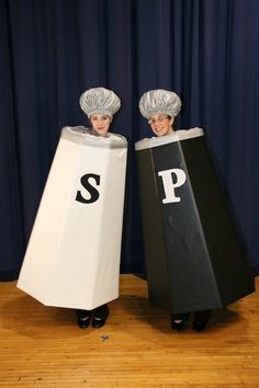 two people dressed as chefs standing next to each other