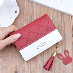 Brand Name: HEONYIRRYMain Material: PUOrigin: CN(Origin)Wallet Length: ShortItem Weight: 0.09kgLining Material: PolyesterItem Height: 9cminchMaterial Composition: pu leatherPattern Type: PatchworkStyle: CasualModel Number: B741Interior: Interior Slot PocketInterior: Interior Zipper PocketInterior: Interior CompartmentInterior: Zipper PouchtInterior: Coin PocketInterior: Note CompartmentInterior: Photo HolderInterior: Card HolderItem Width: 1.5cmGender: WOMENItem Length: 12cminchItem Type: Wallet Mini Money, Simplicity Fashion, Bill Holder, Patchwork Fashion, Pocket Notes, Zipper Purse, Short Wallet, Plaid Fashion, Money Bag