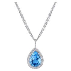 For Sale on 1stDibs - Handmade Pear Shaped Blue Topaz Diamond Drop Pendant. This beautiful pendant features a 17.74 carat pear shaped blue topaz. There is an additional 122 Pear Shape Pendant, Diamond Drop Pendant, Pear Shaped Pendant, Tanzanite Pendant, Blue Topaz Pendant, Blue Jewelry, Diamond Drops, Dream Jewelry, Drop Necklace