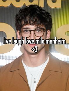 a man with glasses that says i live laugh love mio manne m 3