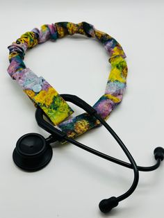 Monet Stethoscope Sleeve Made with 100% Cotton Fabric Made from a smoke free home. Hand wash, hang to dry. Protect your stethoscope from dirt, and oils by using this sleeve.  To use this sleeve the bell of your stethoscope must be removable. Remove bell and slide sleeve from the snap side and snap at the Y of your stethoscope. Snap color will vary. The length of the sleeve is 31inches and 1.5 inches wide.  This is an ideal gift for nurses and doctors.  If you would like to order a matching stethoscope sleeve with the scrub cap you have ordered from my shop. Please send me a message, I will be more than happy to accommodate you! Handmade with Love. Made in the USA Free Shipping USA only. Stethoscope Holder, Green Stethoscope, Yellow Stethoscope, Personalized Stethoscope, Stethoscope Cover, Scrub Caps, Nurse Gifts, Ideal Gift, Accessories Hats