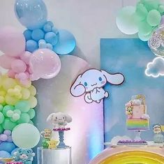 a room filled with balloons and other decorations