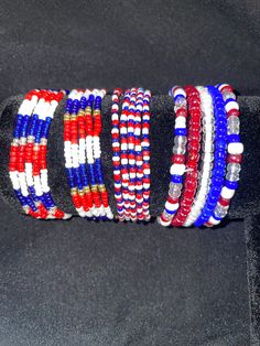 several bracelets with red, white and blue beads