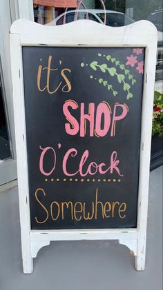 a chalkboard sign that says it's shop o'clock somewhere