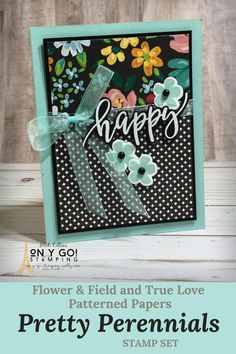 a card with flowers and the words happy on it