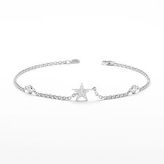 Polaris You’ll always reach for this star. This dainty 14k gold diamond bracelet would make a great celestial gift for a friend! Choose your favorite among Yellow Gold, White Gold, and Rose Gold. - Handmade- Solid Gold- Natural Diamond - G Color, SI Quality Diamonds- Total Diamond Carat Weight: .10 ctw- Bezels: 2.8 mm- Dimensions of the Star: 6 mm All pieces come beautifully boxed in suede pouches you can always use (which really comes in handy when traveling!) Celestial Gifts, Station Bracelet, Bracelets Gold Diamond, Sparkling Diamond, Bezel Set Diamond, Diamond Star, Star Bracelet, Dainty Bracelets, Diamond Carat