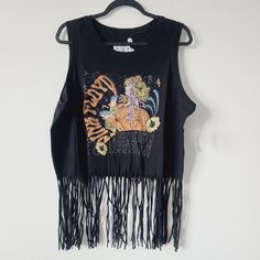 Torrid Pink Floyd Classic Fit Cotton Fringe Tank Plus Size 5x Black Condition: New With Tags. Black Bohemian Tops With Fringe, Bohemian Black Tops With Fringe, Black Tops For Music Festival In Spring, Black Fringe Tops For Summer, Black Top For Spring Music Festival, Double Layer Tank Top, Handkerchief Hem Top, Babydoll Tank Top, Lace Up Tank Top