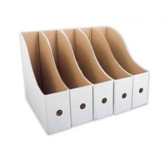 four white files with holes in each side and one on the other, all lined up