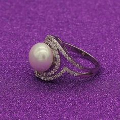 Material: solid sterling silver, platinum plated, heart and arrow zircon Pearl: 10mm Weight: 4.5g 0.9mm pin for half drilled pearl or bead The listed price is only for the setting, without any pearl or bead DISCOUNTS ON LARGE ORDERS Get 10% off for order $50-$99 Get 15% off for order $99-$199 Get 20% off for order $200-$399 Get 25%off for order $400 and more For order over 300 dollars will be shipped by FEDEX or TNT for free. All the discounts will be effective automatically when check out. Diamond White Sterling Silver Pearl Ring Gift, Silver Open Pearl Ring For Jewelry Making, Gift Diamond White Pearl Ring In Sterling Silver, Silver Hallmarked Round Cut Pearl Ring, Silver Pearl Ring With Prong Setting, Silver Pearl Ring With Halo Setting For Anniversary, Silver Pearl Ring With Halo Setting, 300 Dollars, Diy Gem