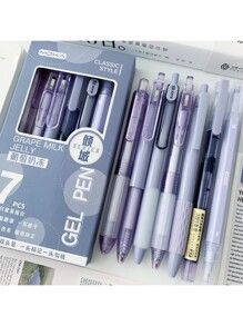 several different pens are in the package on top of each other and one is purple