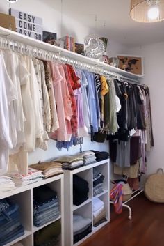 Organize Wardrobe Closet Open Closet with lots of color