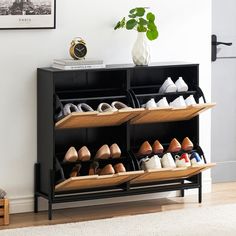 there is a shoe rack with many pairs of shoes on it